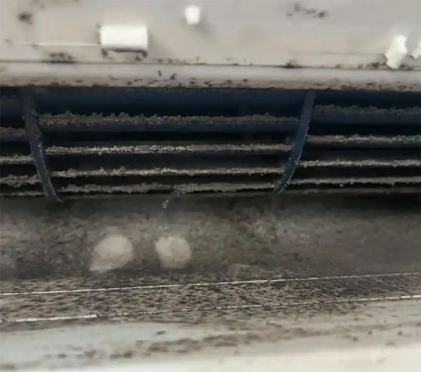 漳州市空调吹的风有股烧焦味是怎么回事